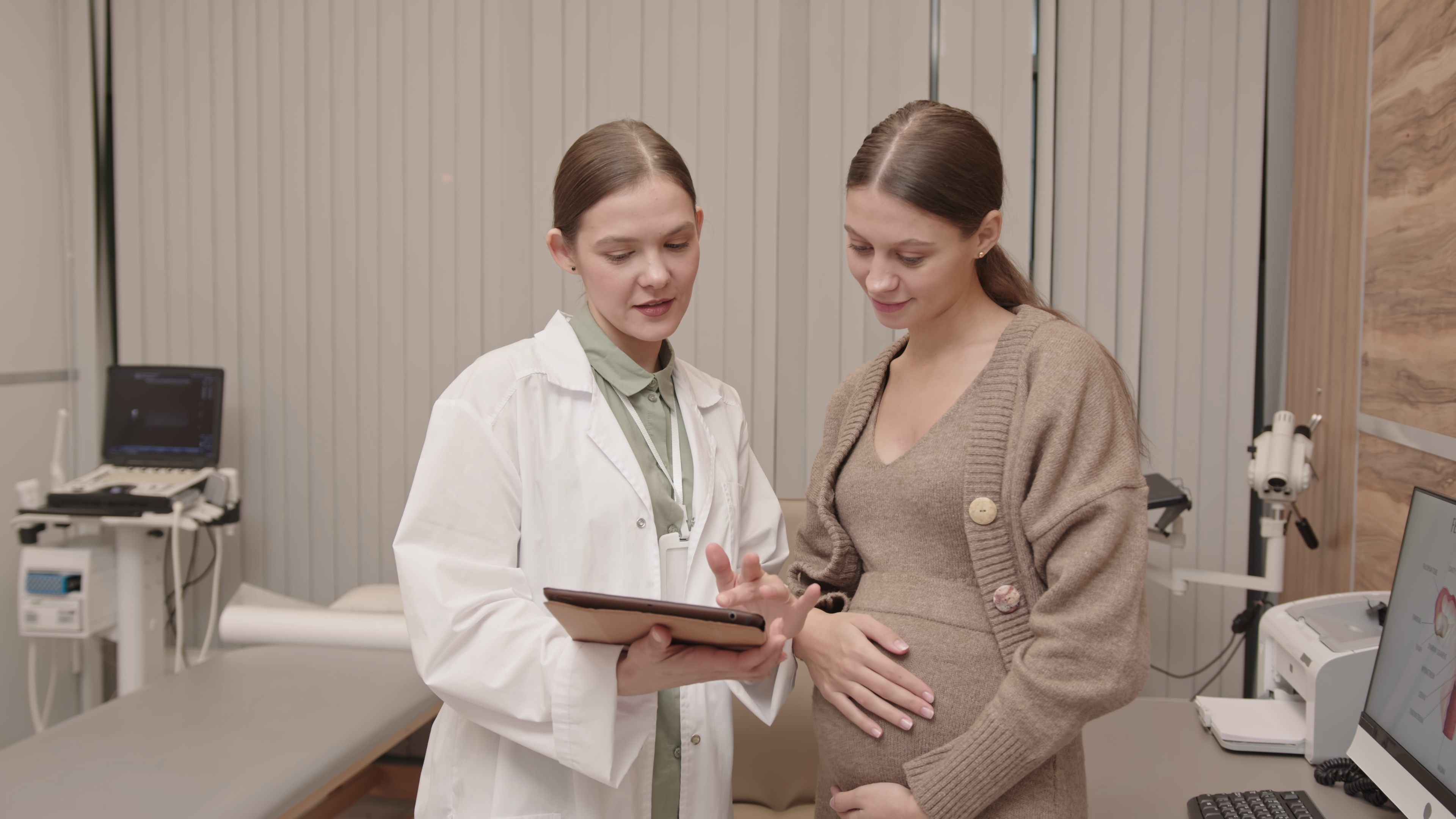 Female gynecologist with tablet
